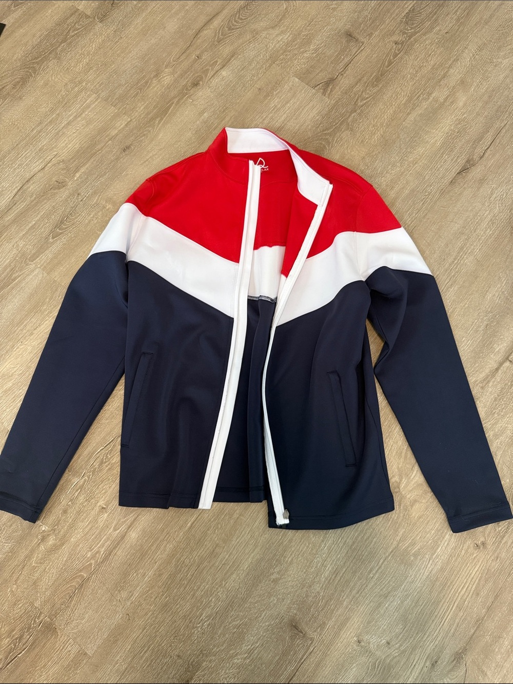 Red, white and blue zip up jacket